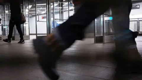 Getty Images Close up of legs of someone walking