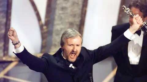 Getty Images James Cameron winning for Titanic at the Oscars