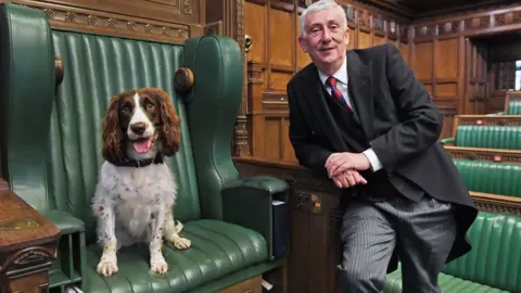 UK Parliament/Jessica Taylor Poppy in Speaker's chair alongside Sir Lindsay Hoyle