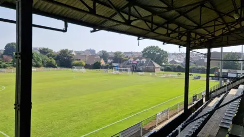 Harwich and Parkeston FC A photo of the Royal Oak, from the point of view from the grandstand