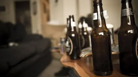 Getty Images Empty beer bottles