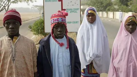 AFP Four children affected by the Pfizer trial in Kano pictured in 2008