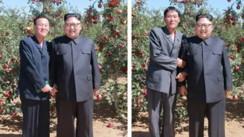 NKLW These show individual photos Kim Jong Un took with fruit farmers showing both arm locking and hand holding