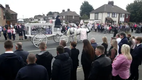 Reuters People lined the streets to pay their respects to Olivia, 9