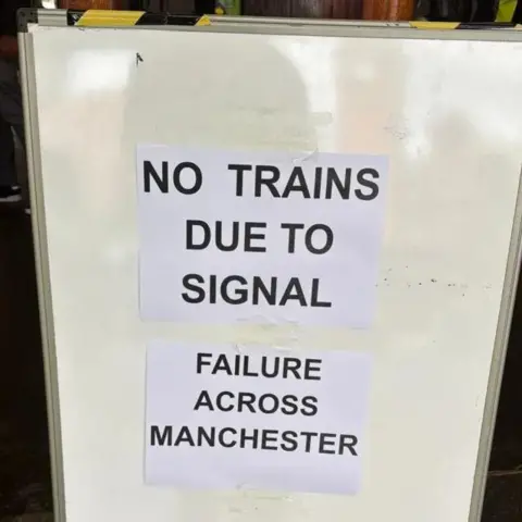 SUPPLIED A sign in Manchester warns passengers there are 'no trains due to signal'