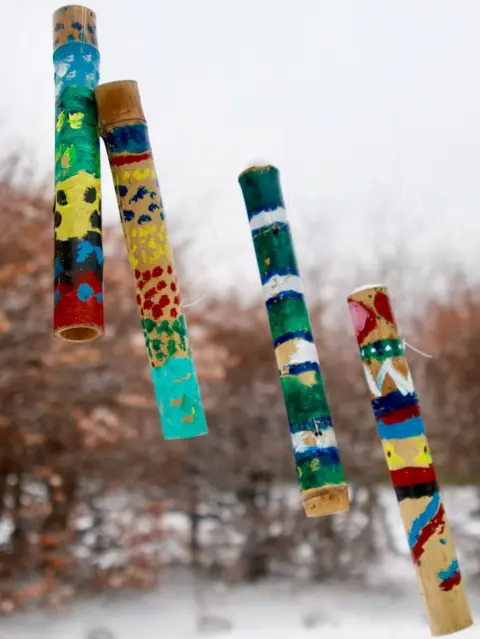 Gillian Bensemann Artwork on handing wood