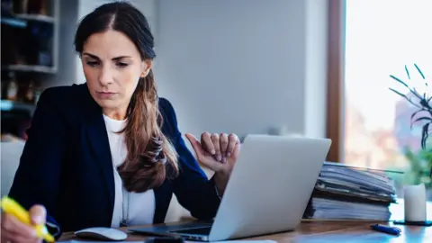 Getty Images Woman working from home