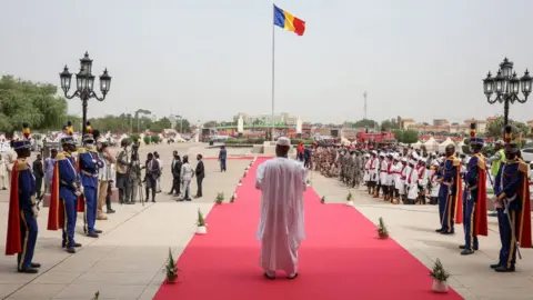 AFP A general view of people gathering ahead of Chad President-elect General Mahamat Idriss Deby Itno's inauguration at the Palace of Arts and Culture in N'Djamena on May 23, 2024.