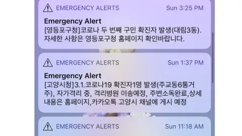 Examples of the messages Koreans get, alerting them to new cases