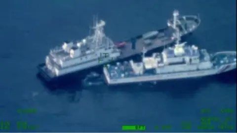 Aerial view of a Chinese militia vessel bumping into a Philippine coast guard ship