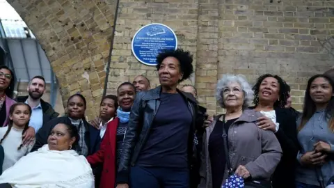 PA Media Relatives of Wilston Samuel Jackson at plaque unveiling