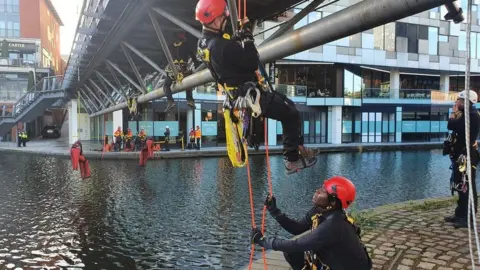 West Midlands Fire Service A rope rescue by the canal