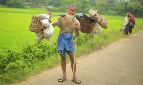 BBC After leaving everything else in Myanmar, Rohingya Abu Tabel arrives in Bangladesh with the last of his belongings