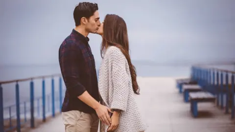 Getty Images Couple kissing