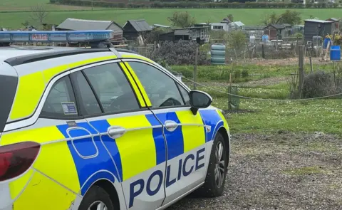 Cambridgeshire Police A police car at Ickleton allotment