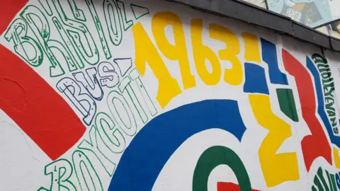 Julz Davis A photo of an unfinished mural