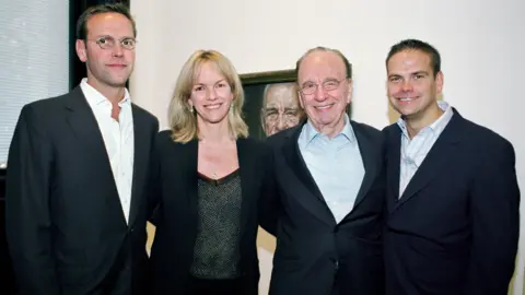 Getty Images Left to right: James Murdoch, Elisabeth Murdoch, Rupert Murdoch and Lachlan Murdoch pictured in 2007