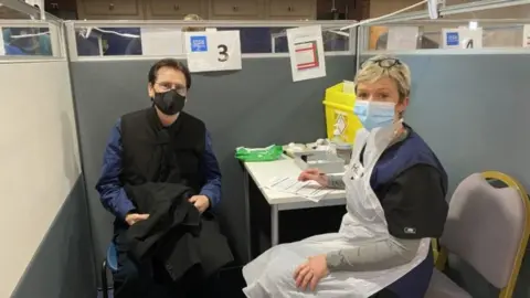 HEC Ltd 2021/PA Wire Shakin' Stevens receiving coronavirus vaccine