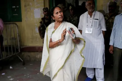 Reuters Mamata Banerjee, the Chief Minister of West Bengal and chief of Trinamool Congress (TMC), gestures as she talks to media after casting her vote at a polling station during the final phase of general election in Kolkata, India, May 19, 2019.