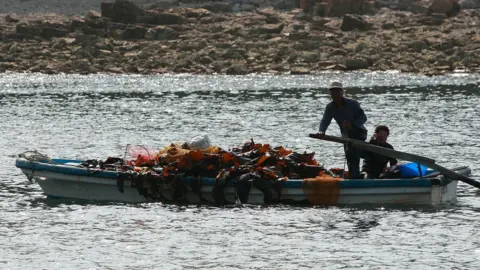 Getty Images File photo of fishermen steering a boat on Baengnyeong Island on June 15, 2010, South Korea.