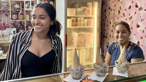 BBC Aray and her mother at their ice cream parlour.