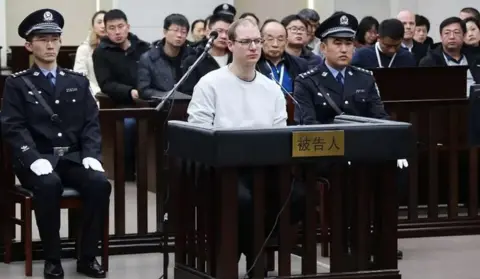 Intermediate Peoples Court of Dalian via AFP/Getty Robert Schellenberg during his retrial on drug trafficking charges in the court in Dalian in China's Liaoning province, on 14 January 2019