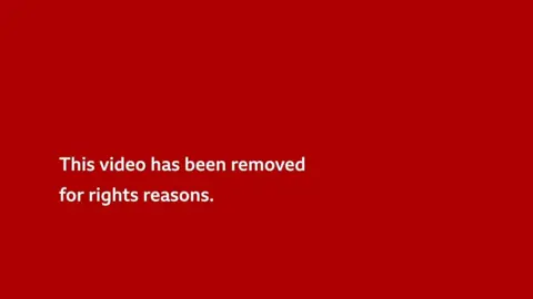 The words 'This video has been removed for rights reasons' on a red background