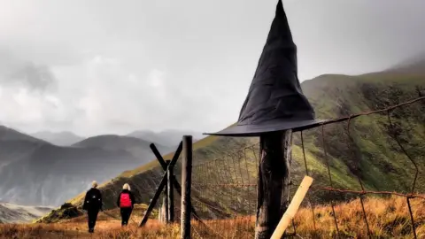 Mel Garside A witches hat on a fence post in Snowdonia