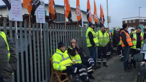 BBC Striking workers at the depot