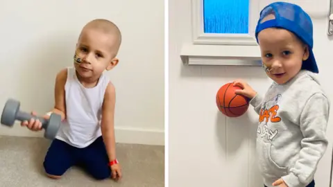 Egle Jasinauskiene Adamas playing with toys