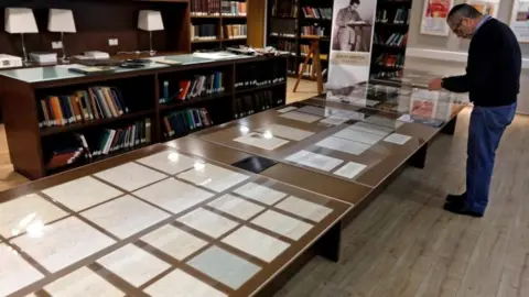 AFP Manuscripts on display inside an exhibition at the Hebrew University of Jerusalem