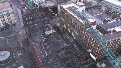 iProsurve The fire-damaged top of the Bank Buildings as seen from above