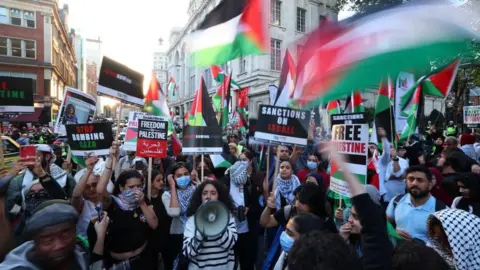 Reuters Pro-Palestinian demonstrators near the Israeli embassy in London