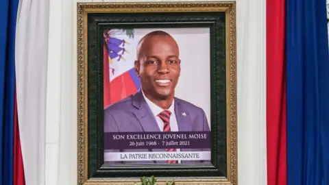 Getty Images Officials attend a ceremony in honour of late Haitian President Jovenel Moise at the National Pantheon Museum in Port-au-Prince, Haiti, on July 20, 2021.