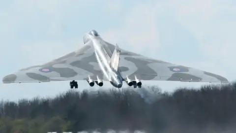 Charles Toop/PA Wire XH558 taking off