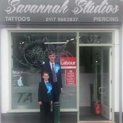 Jacob Rees-Mogg A picture of the MP and his young son standing outside a tattoo parlour which has a Labour sign in the window. Rees-Mogg shared this image of him campaigning with his young son with the caption 'We shall have to take our business elsewhere'. It was liked thousands of times.