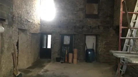 Charles Goodall The derelict Bridge Inn in 2016, before it was converted into housing