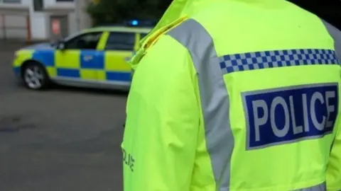 Getty Images Police officer in high-vis jacket