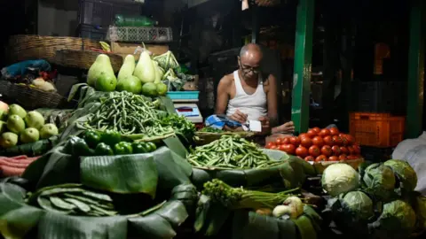 Getty Images A vegetable market in Kolkata, India, 14 March, 2022.