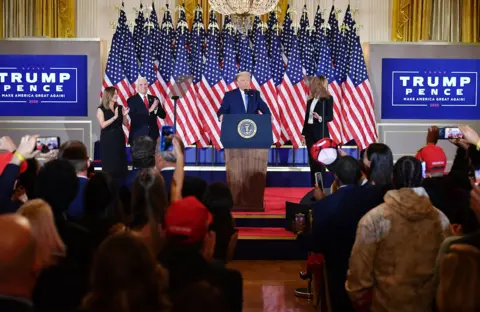 Getty Images Trump speaks during election night, early on 4 November 2020