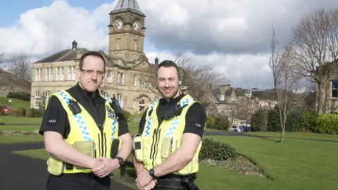 West Yorkshire Police PC Craig Nicholls (l) and PC Jonathan Wright (r)