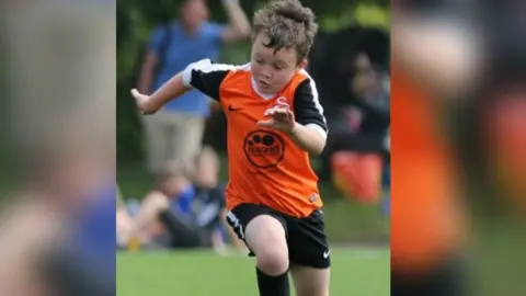 Family Rafe Lawton playing football