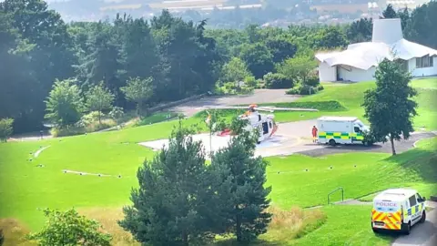 BBC Coastguard helicopter landing at hospital