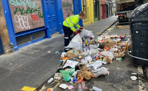 West Port, refuse worker