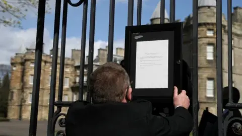 Reuters notice on palace gate