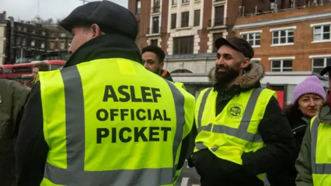 Getty Images Aslef workers on strike on 5 January