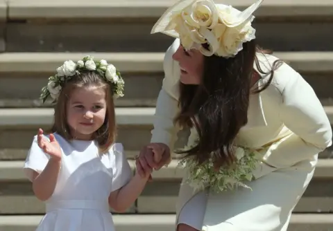 AFP Princess Charlotte waves next to her mother, the Duchess of Cambridge