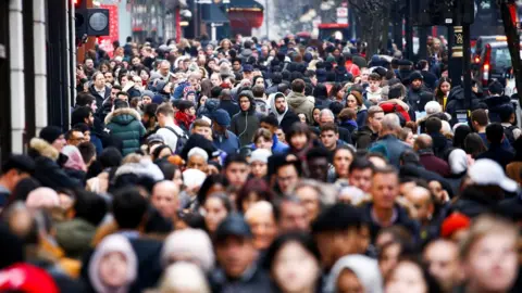 Reuters Shoppers on Oxford Street, London