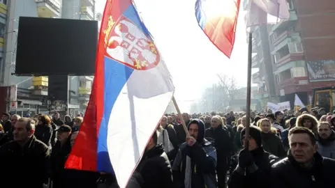 EPA Ethnic Serbs protested in northern Kosovo, waving Serbian flags