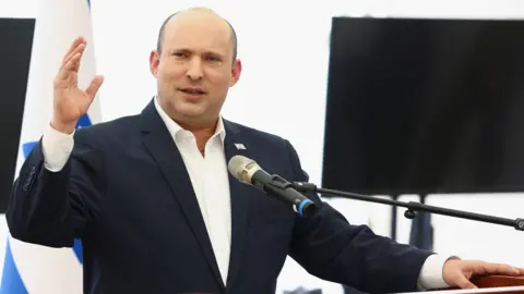 Naftali Bennett speaks at the Jewish settlement of Beit El, in the occupied West Bank (5 April 2022)